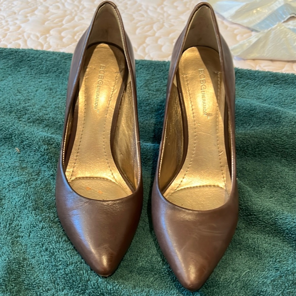 Brown four inch pumps.